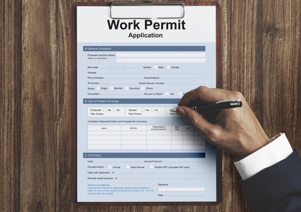 Work permit form being filled